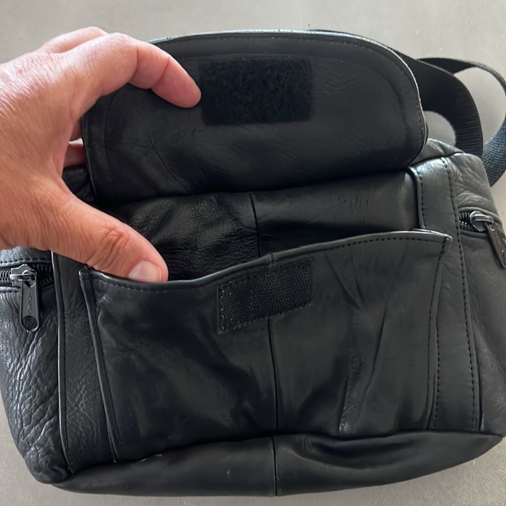 Like new black leather Fanny pack with multiple zippered compartments. - Picture 5 of 8